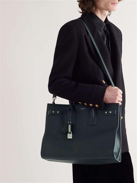 Sac de jour large in grained leather .